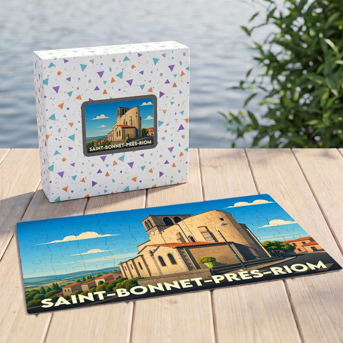 Puzzle souvenir de la ville de Saint-Bonnet-près-Riom avec une illustration stylisée de son église.