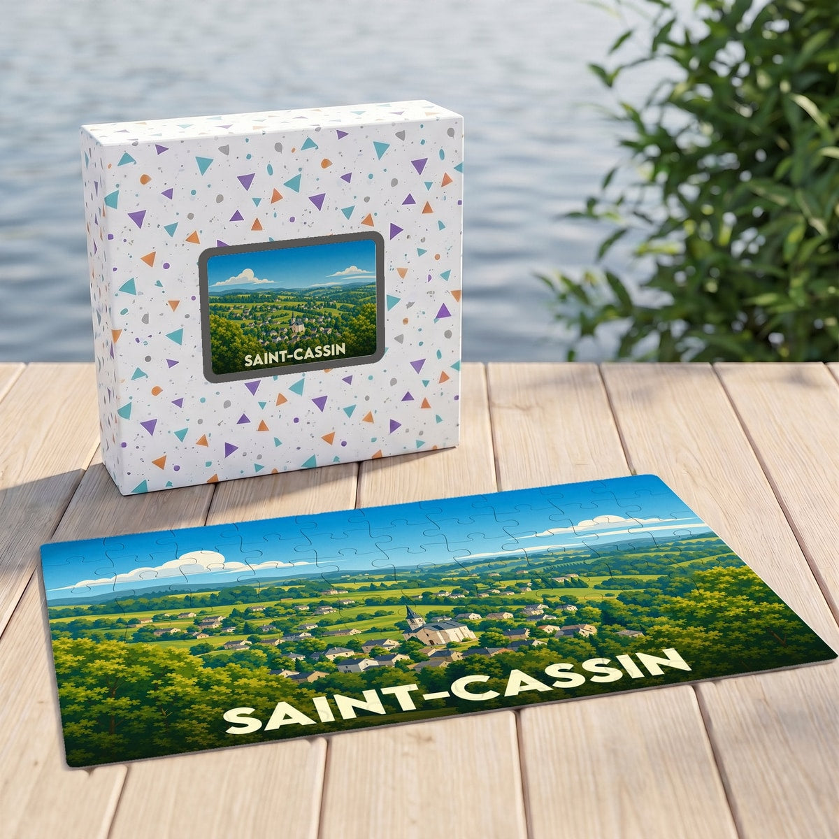Puzzle souvenir de la ville de Saint-Cassin avec une illustration de paysage champêtre.