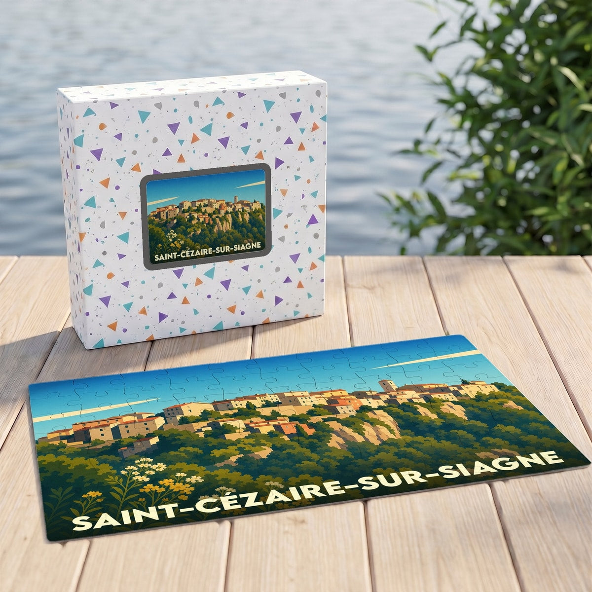 Puzzle souvenir de la ville de Saint-Cézaire-sur-Siagne avec une illustration panoramique stylisée.