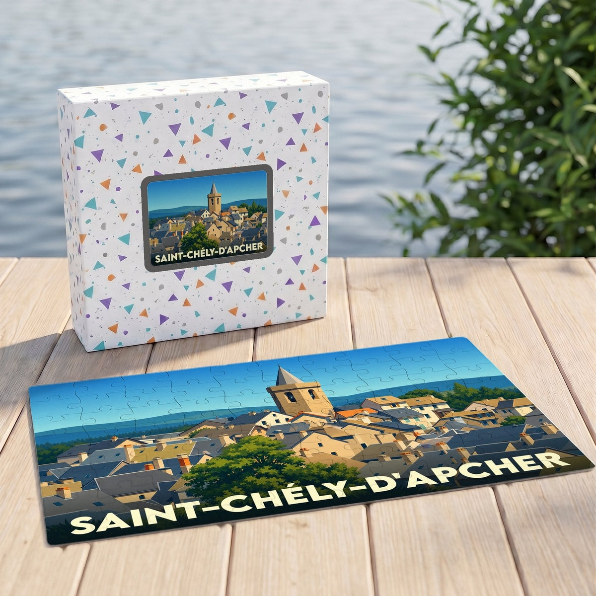 Puzzle souvenir de la ville de Saint-Chély-d'Apcher avec une illustration stylisée et colorée de ses toits.