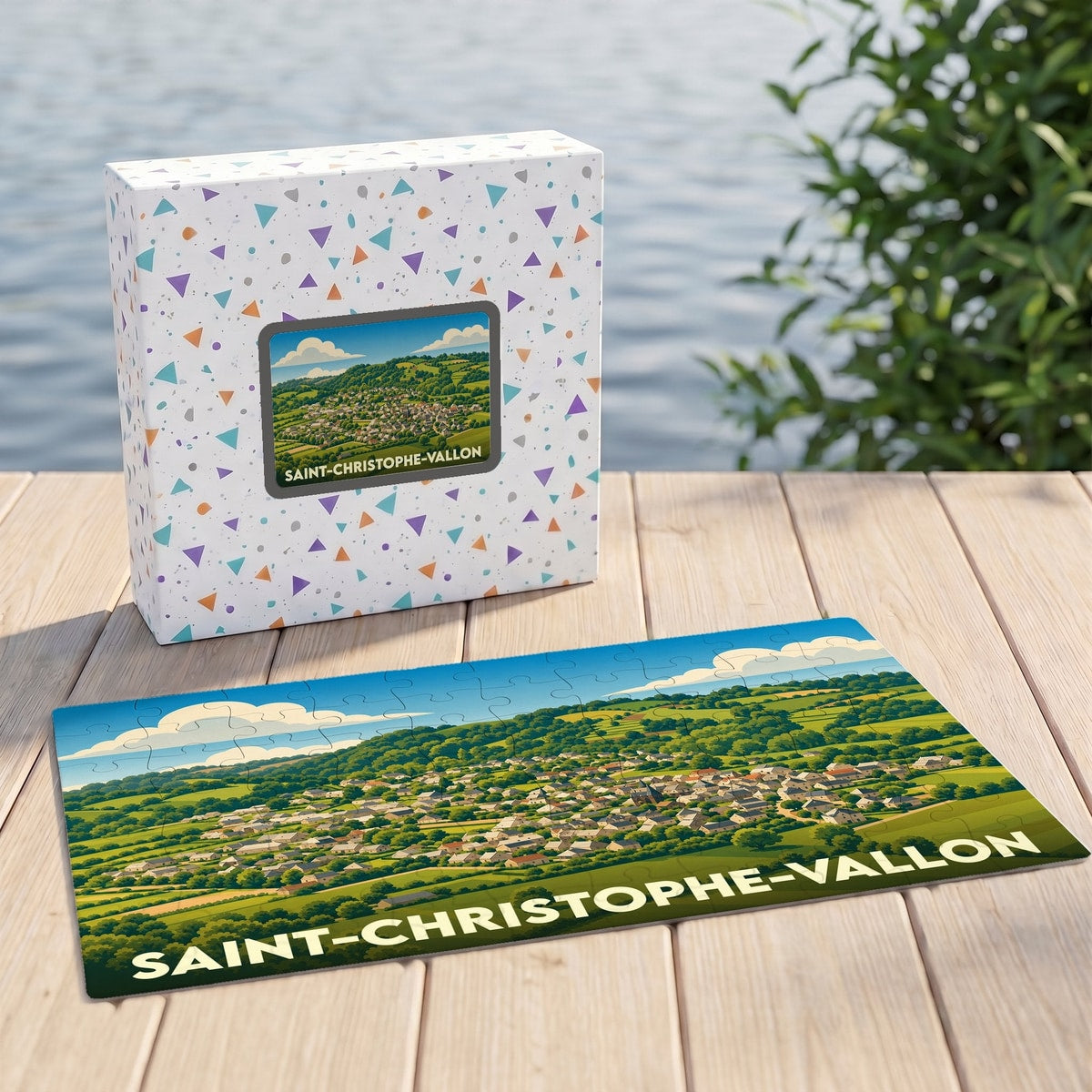 Puzzle souvenir de la ville de Saint-Christophe-Vallon avec une illustration panoramique et colorée.