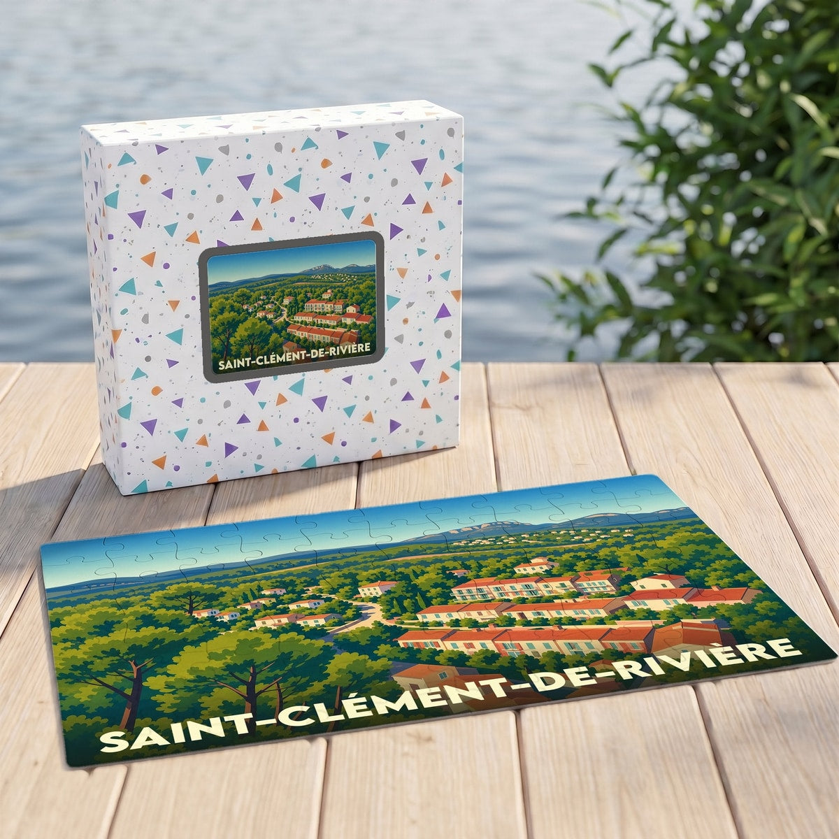 Puzzle souvenir de la ville de Saint-Clément-de-Rivière avec une illustration stylisée de son paysage urbain.