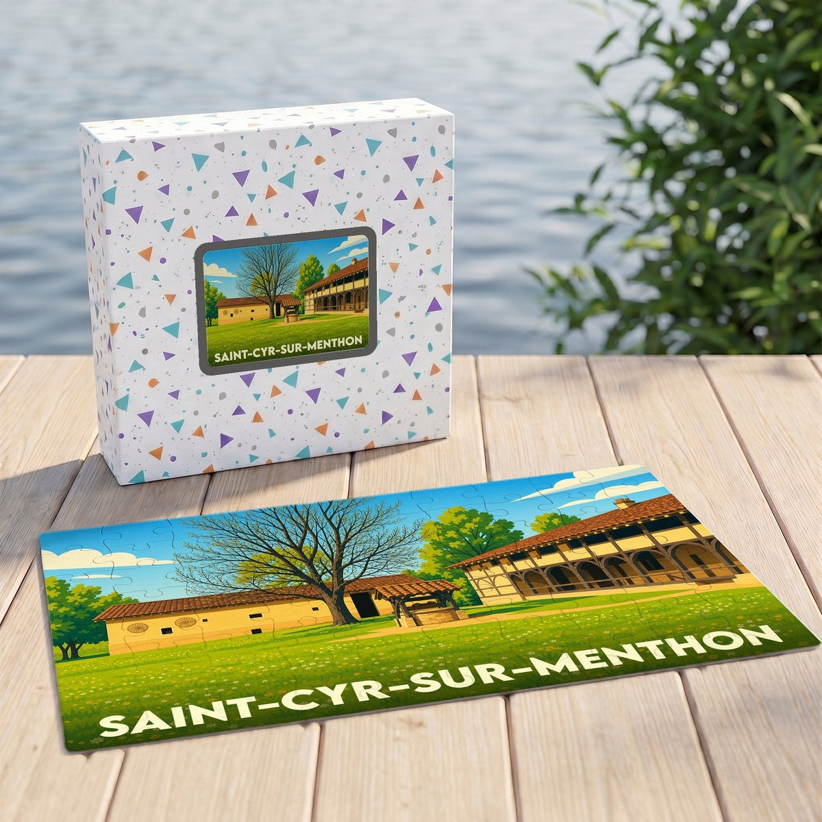 Puzzle souvenir de la ville de Saint-Cyr-sur-Menthon avec une illustration stylisée de ses bâtiments historiques.