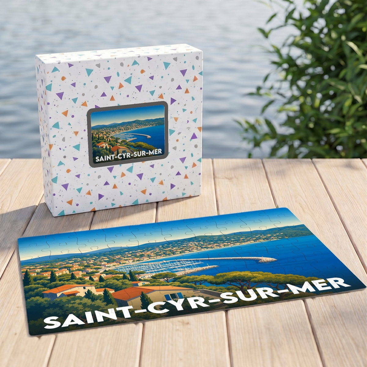 Puzzle souvenir de la ville de Saint-Cyr-sur-Mer avec une illustration stylisée de son littoral.