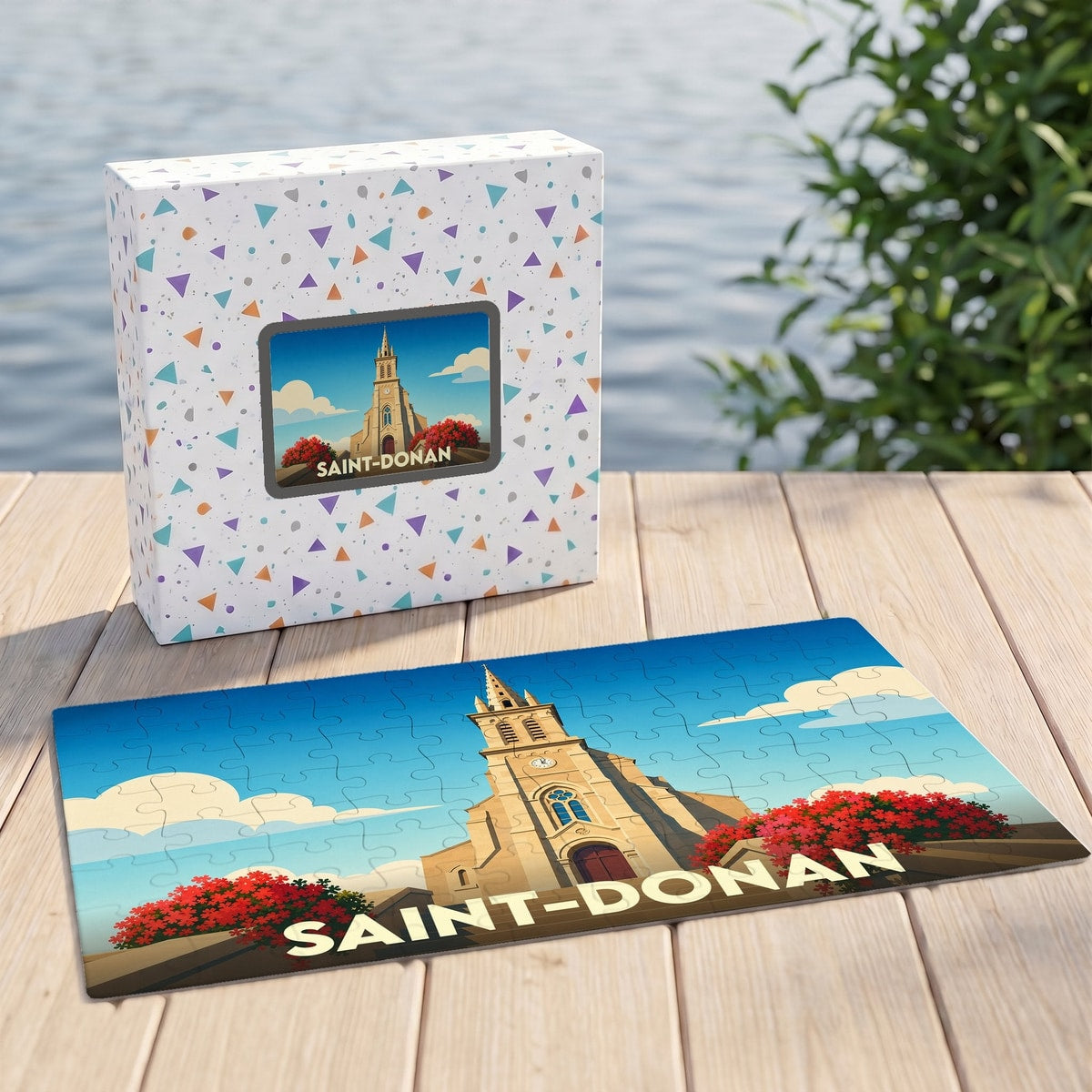 Puzzle souvenir de la ville de Saint-Donan avec une illustration stylisée d'une église.