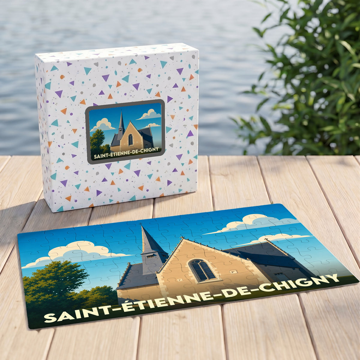 Puzzle souvenir de la ville de Saint-Étienne-de-Chigny avec son illustration stylisée et sa boîte assortie.