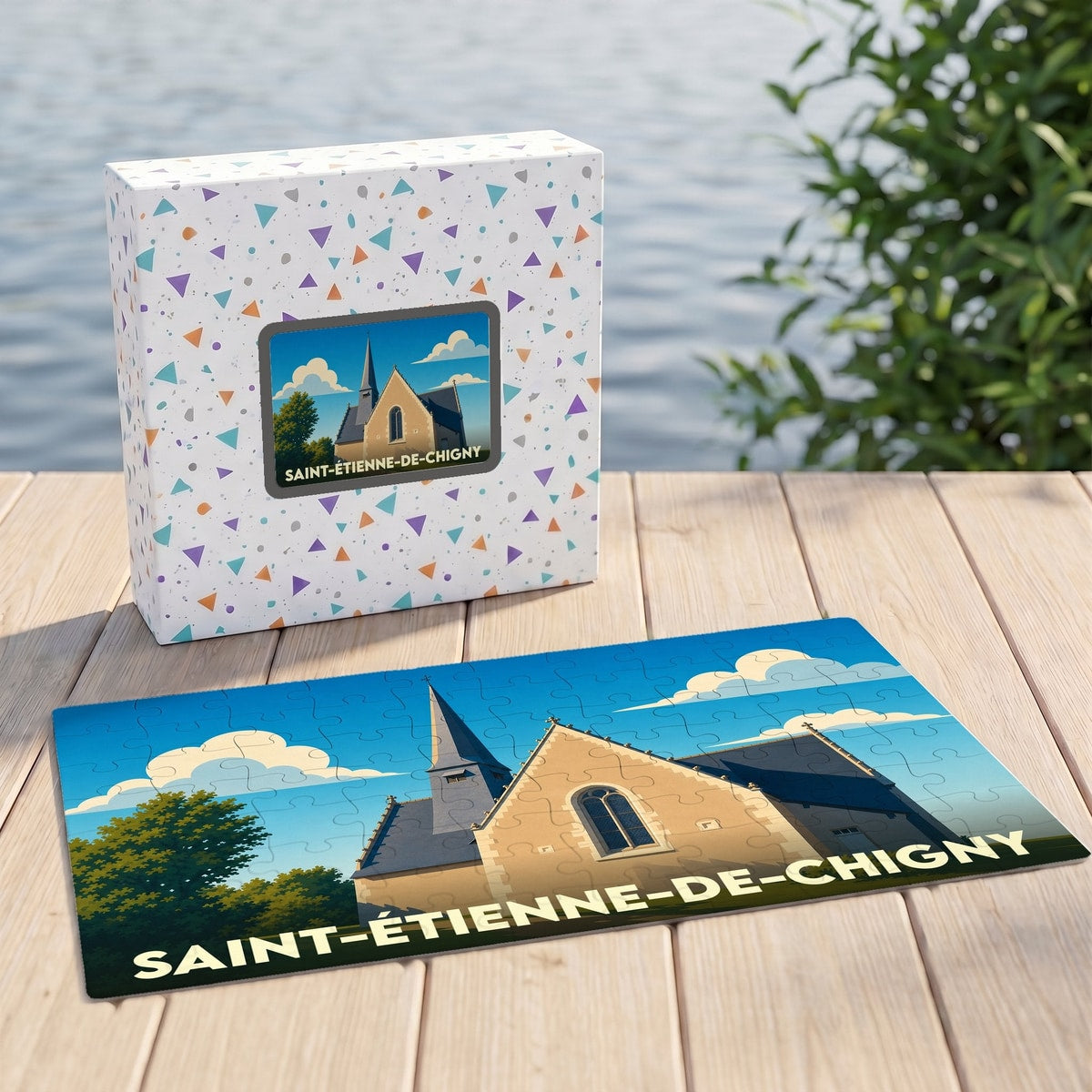 Puzzle souvenir de la ville de Saint-Étienne-de-Chigny avec son illustration stylisée et sa boîte assortie.