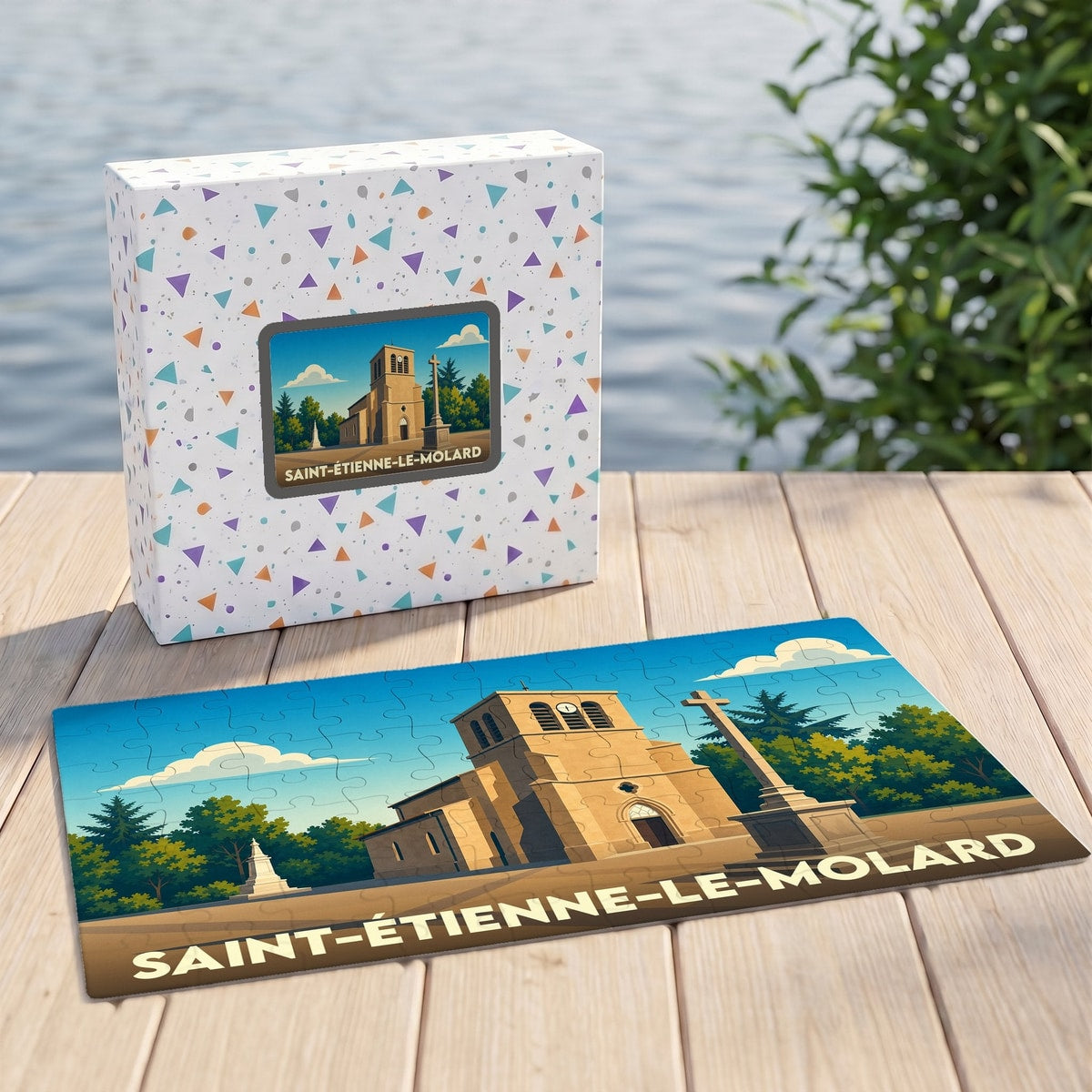 Puzzle souvenir de la commune de Saint-Étienne-le-Molard avec une illustration stylisée de son église.
