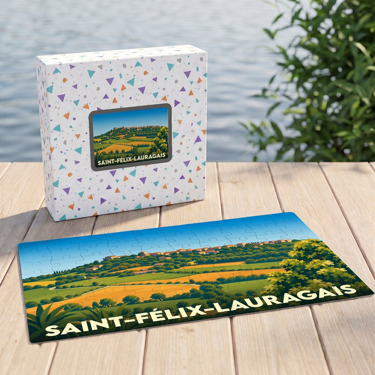 Puzzle souvenir de Saint-Félix-Lauragais avec une illustration paysagère stylisée.