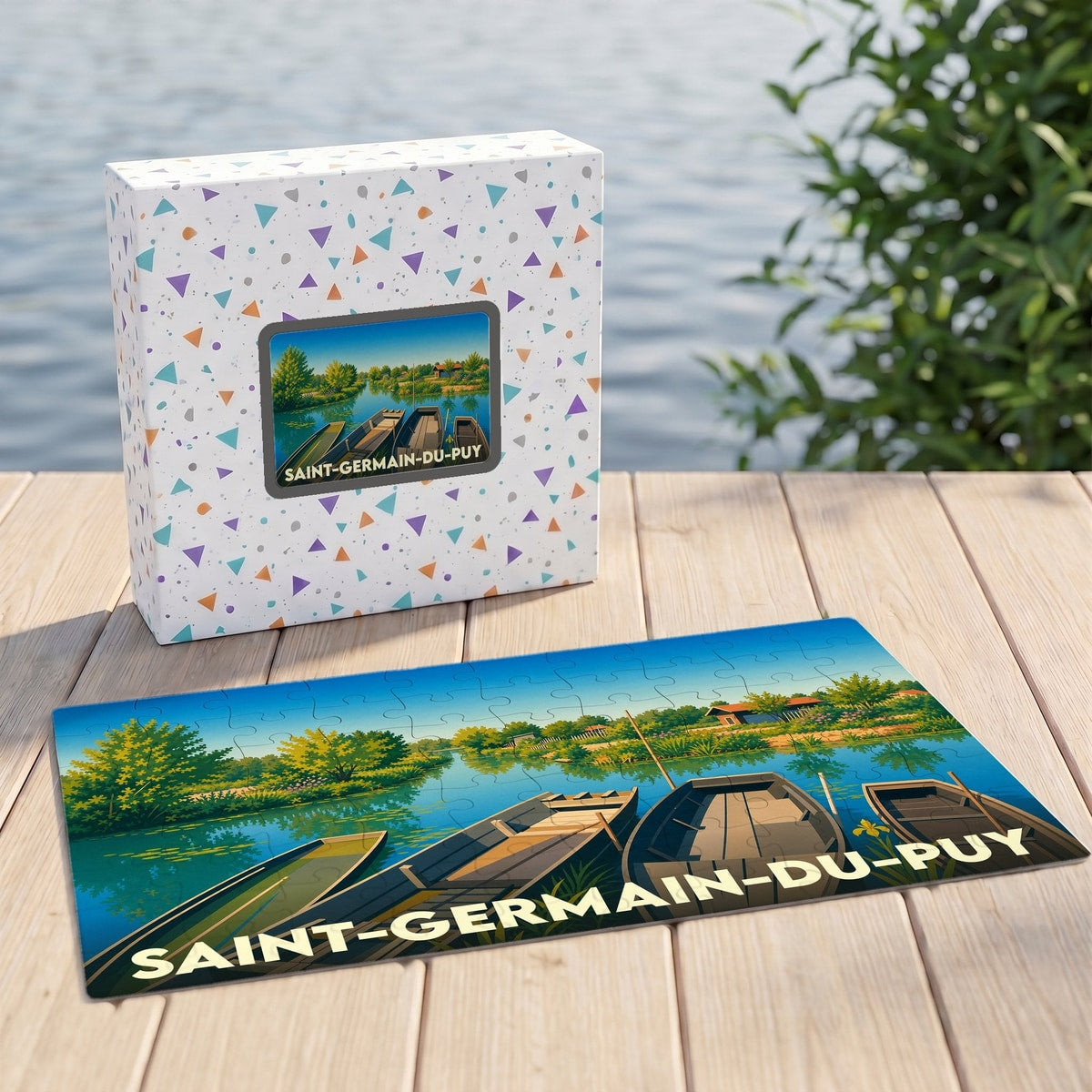 Puzzle souvenir de la ville de Saint-Germain-du-Puy avec une illustration stylisée de barques sur l'eau.