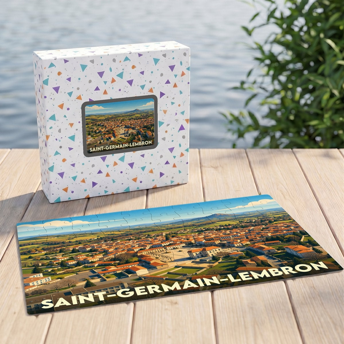 Puzzle souvenir de la ville de Saint-Germain-Lembron avec une vue aérienne illustrée.
