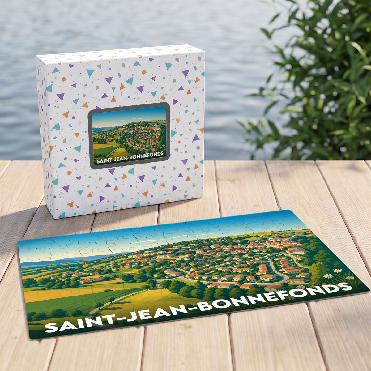 Puzzle souvenir de la ville de Saint-Jean-Bonnefonds avec une illustration stylisée de son paysage urbain et de ses collines.