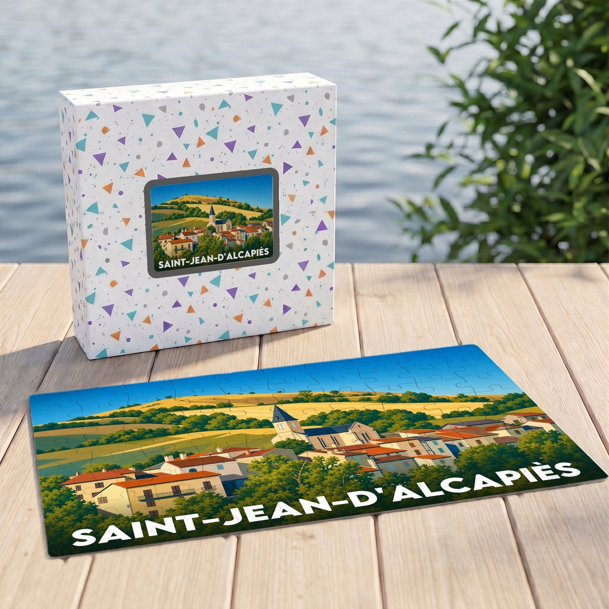 Puzzle souvenir de la ville de Saint-Jean-d'Alcapiès avec une illustration stylisée.