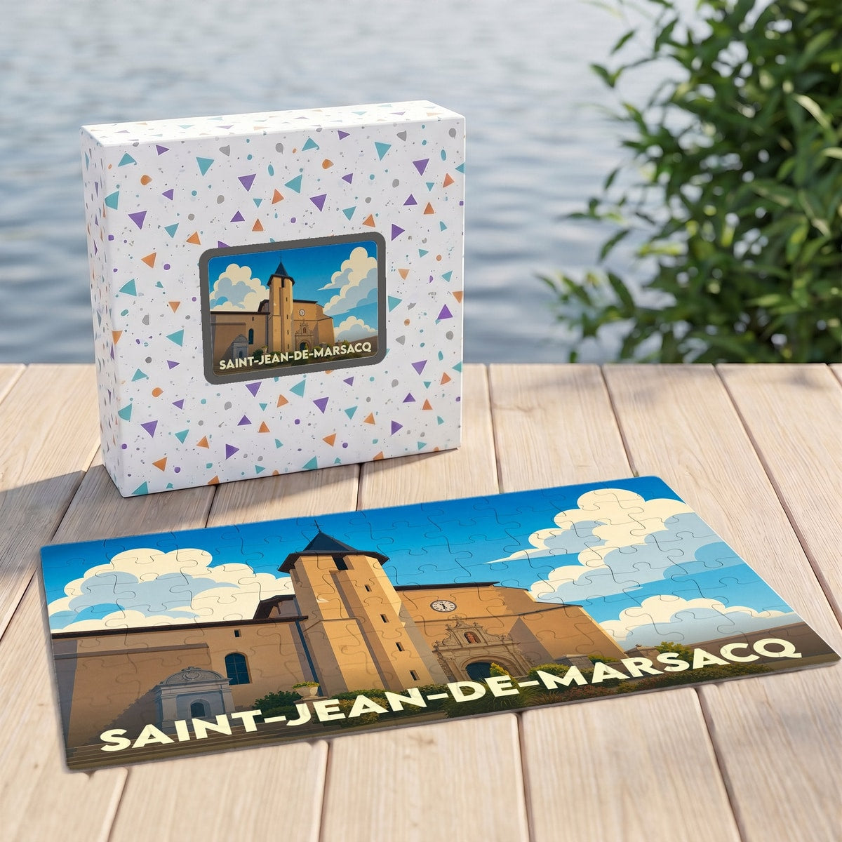 Puzzle souvenir de la ville de Saint-Jean-de-Marsacq avec une illustration stylisée et colorée de son église.