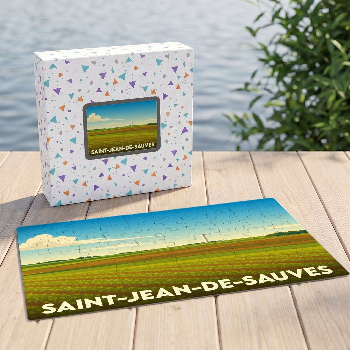 Puzzle souvenir de la ville de Saint-Jean-de-Sauves avec une illustration stylisée d'un paysage de champs.