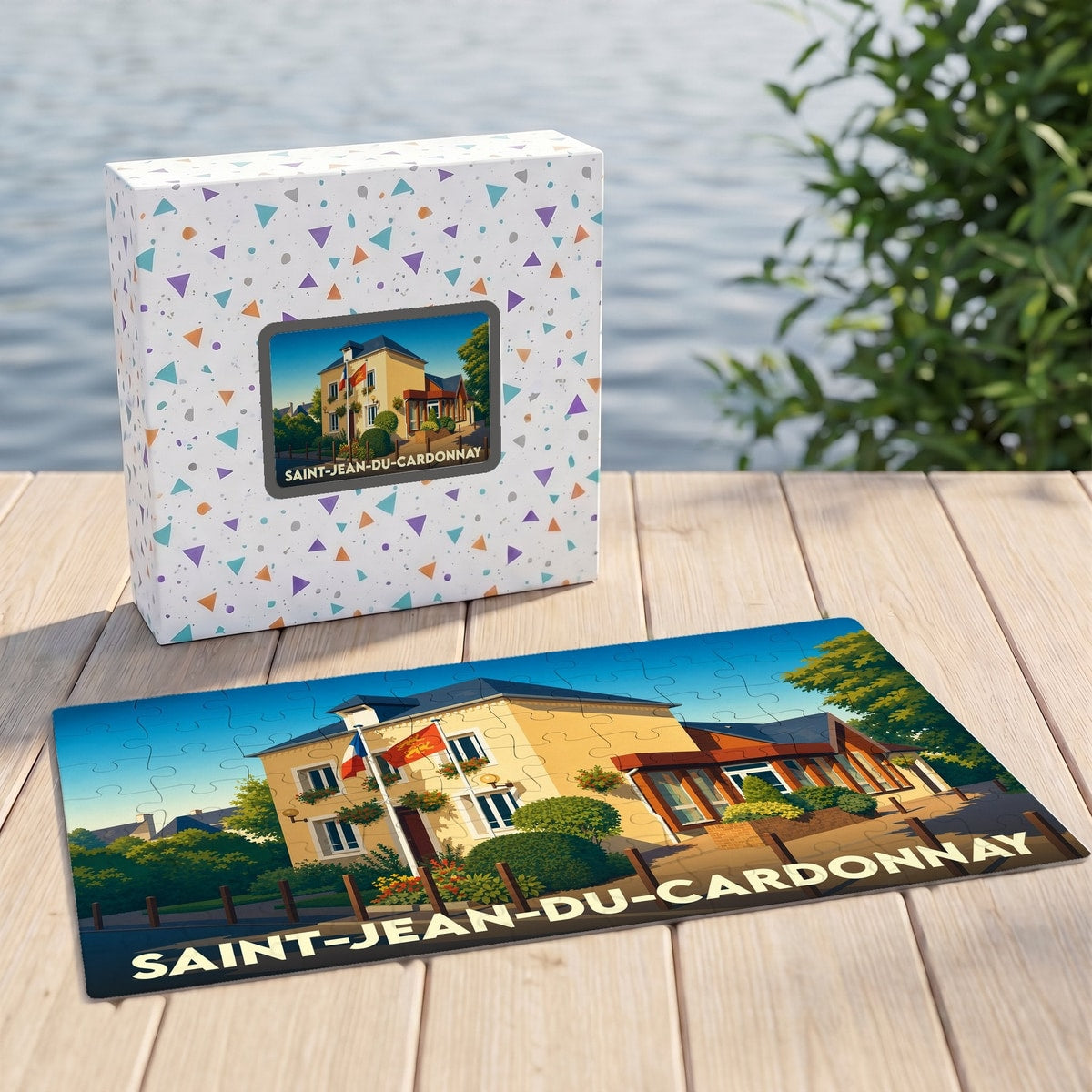Puzzle souvenir de la ville de Saint-Jean-du-Cardonnay avec une illustration stylisée de sa mairie.