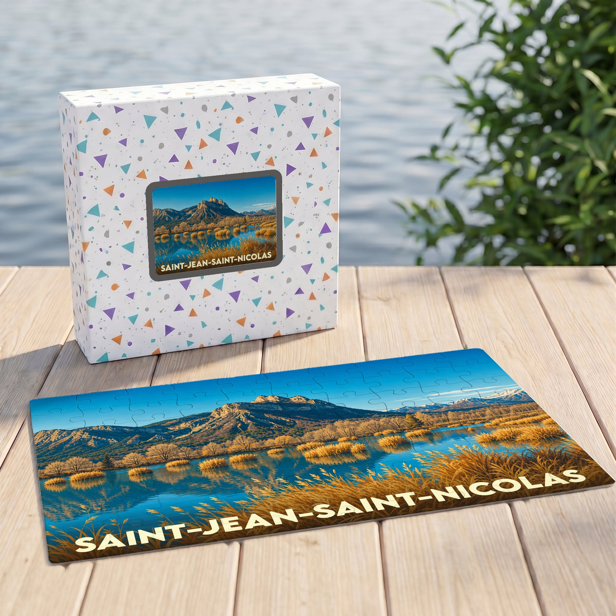 Puzzle souvenir de la ville de Saint-Jean-Saint-Nicolas illustrant un paysage de montagne et son lac.