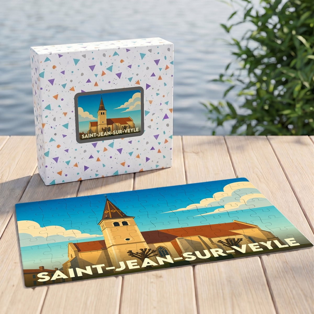 Puzzle souvenir de la ville de Saint-Jean-sur-Veyle avec une illustration stylisée d'une église et de son clocher.