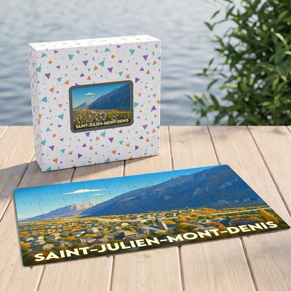 Puzzle souvenir de la ville de Saint-Julien-Mont-Denis avec une illustration stylisée d'un paysage de montagne.