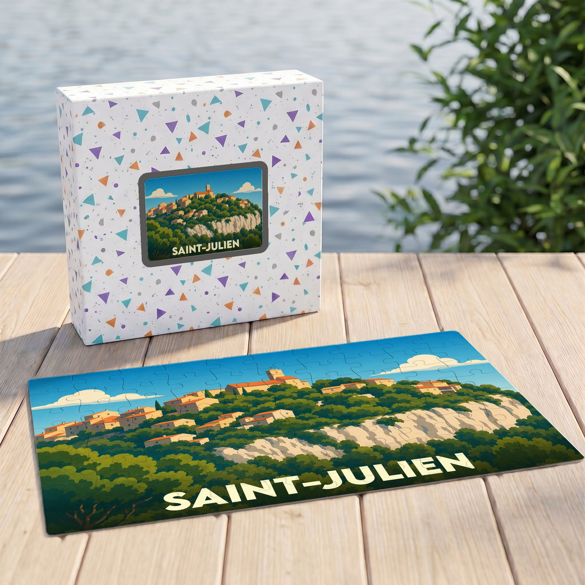Puzzle souvenir de la ville de Saint-Julien avec une illustration stylisée d'un village perché.