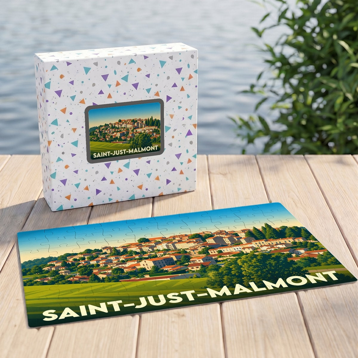 Puzzle souvenir de la ville de Saint-Just-Malmont avec une illustration stylisée et colorée.