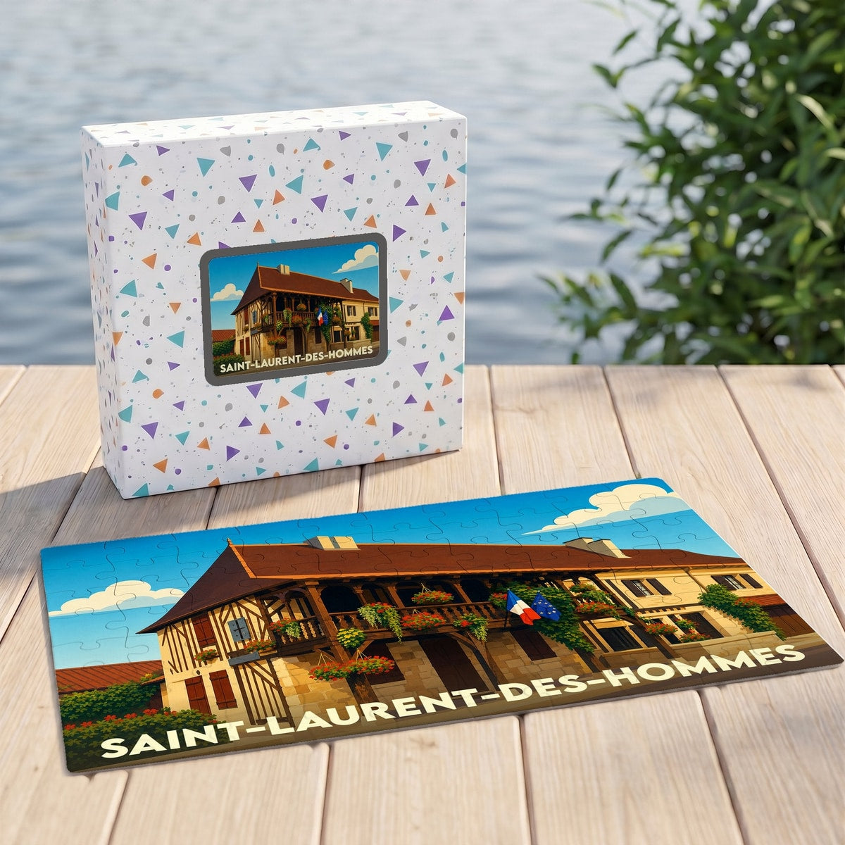 Puzzle souvenir de la ville de Saint-Laurent-des-Hommes avec son illustration assortie sur la boîte.