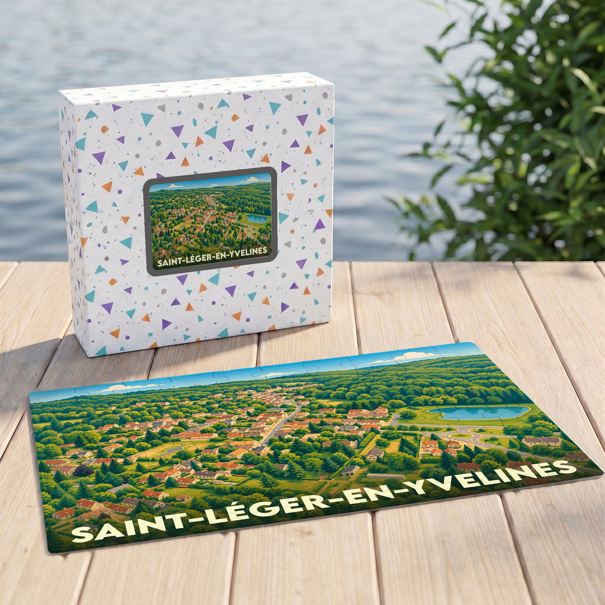 Puzzle souvenir de la ville de Saint-Léger-en-Yvelines illustré par une vue aérienne stylisée du village et de sa forêt.