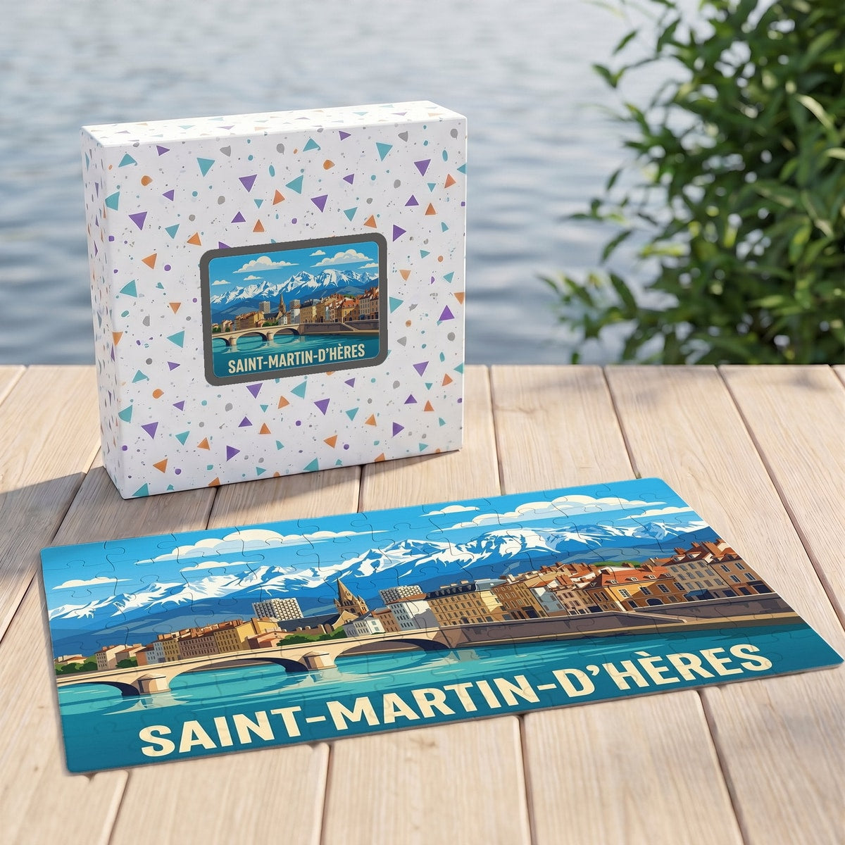 Puzzle souvenir de la ville de Saint-Martin-d'Hères avec une illustration stylisée des montagnes et du front de mer.