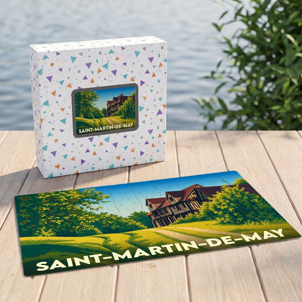 Puzzle souvenir de la ville de Saint-Martin-de-May avec une illustration stylisée d'un manoir normand.