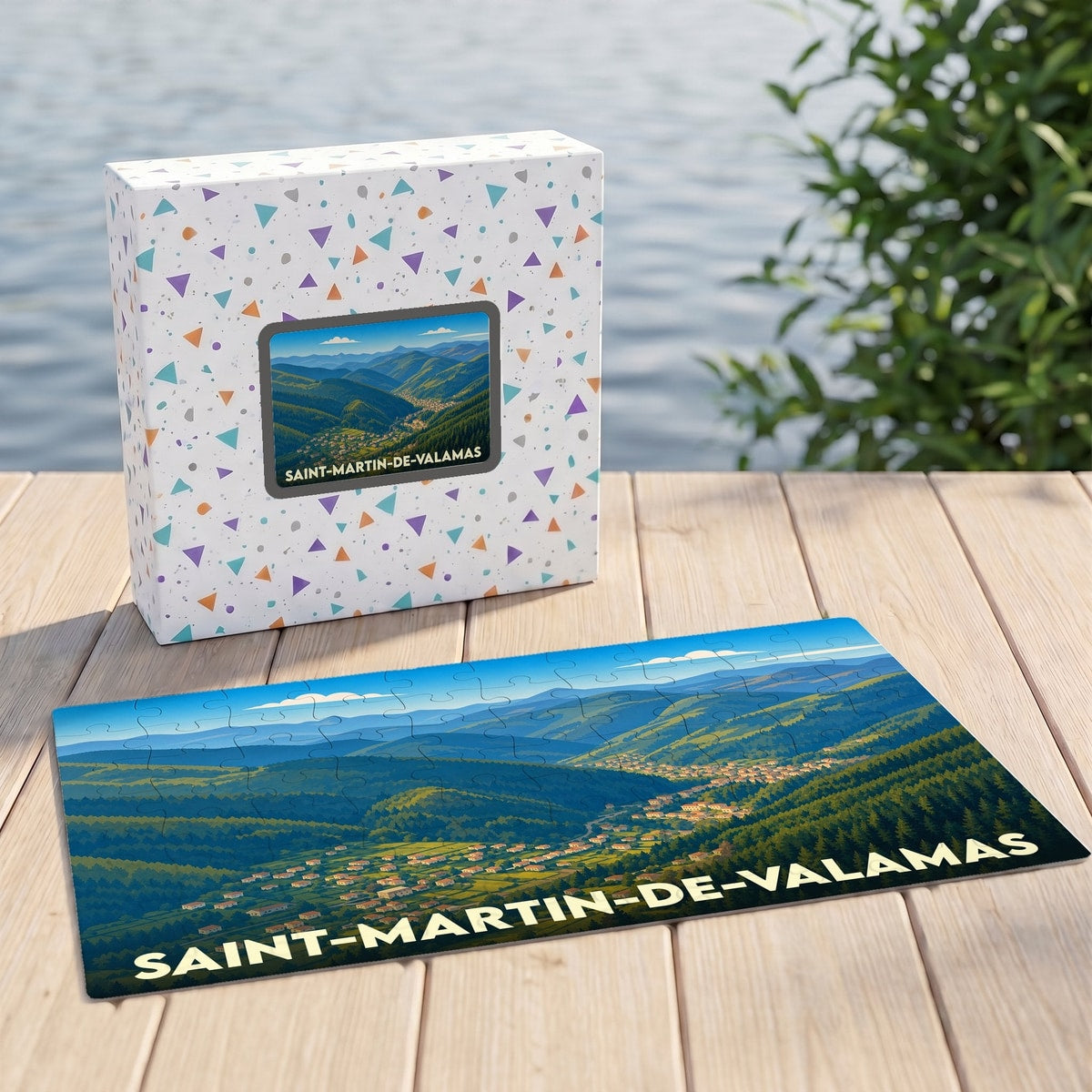 Puzzle souvenir de la ville de Saint-Martin-de-Valamas avec une illustration stylisée d'un paysage montagneux.