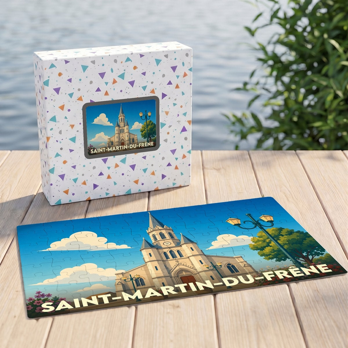 Puzzle souvenir de la ville de Saint-Martin-du-Frêne avec son illustration stylisée de l'église locale.