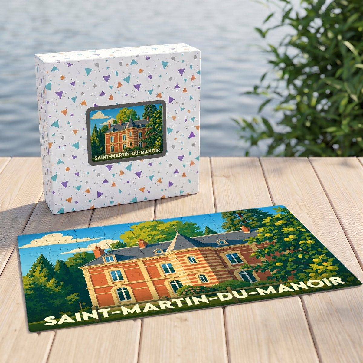 Puzzle souvenir de la ville de Saint-Martin-du-Manoir illustrant un château de briques rouges.
