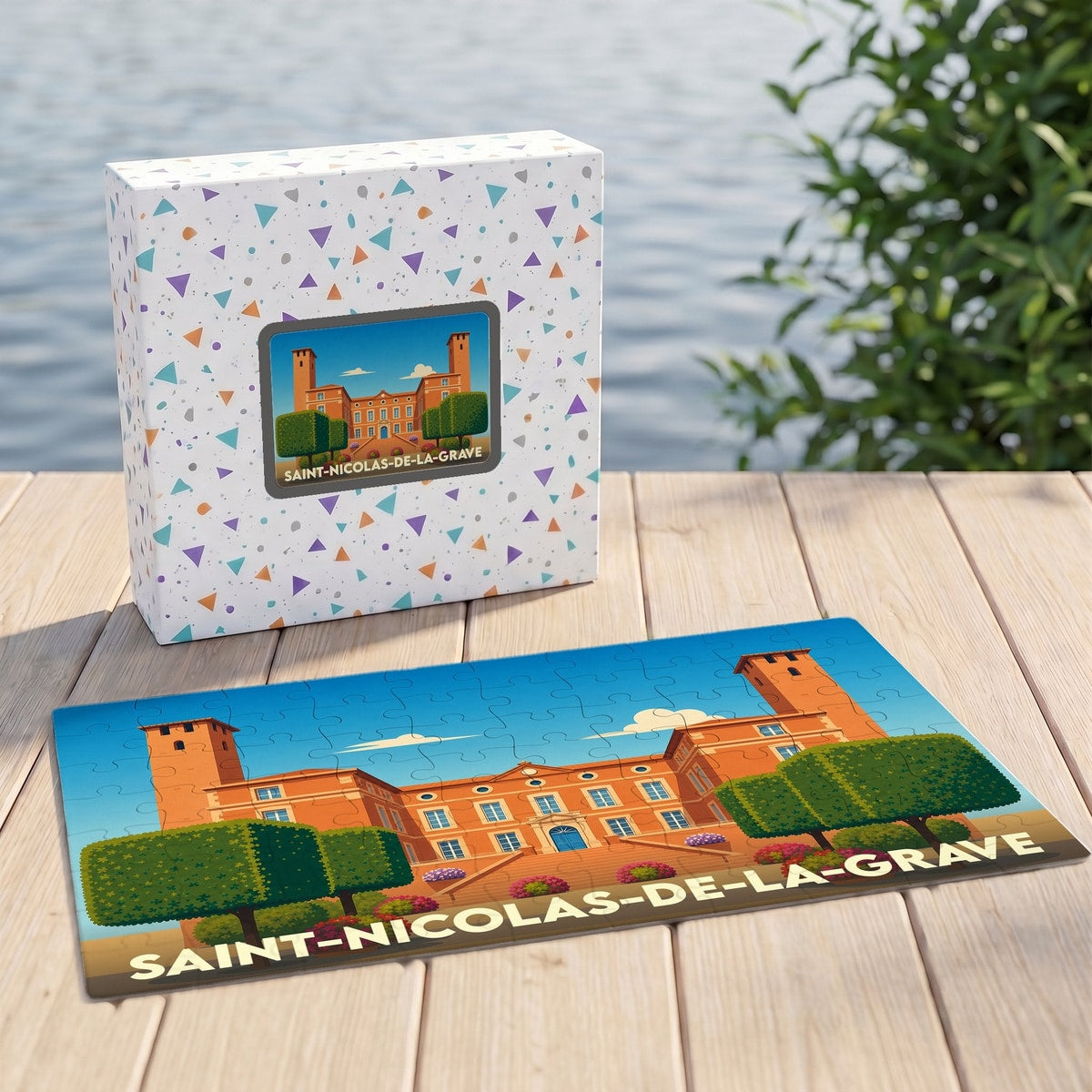 Puzzle souvenir de la ville de Saint-Nicolas-de-la-Grave avec une illustration stylisée du château local.