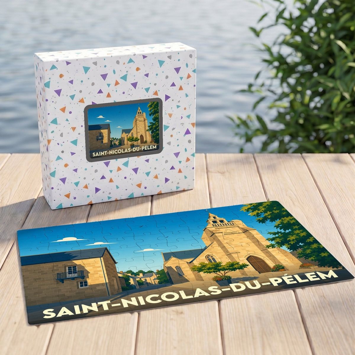Puzzle souvenir de la ville de Saint-Nicolas-du-Pélem avec une illustration stylisée de son église.