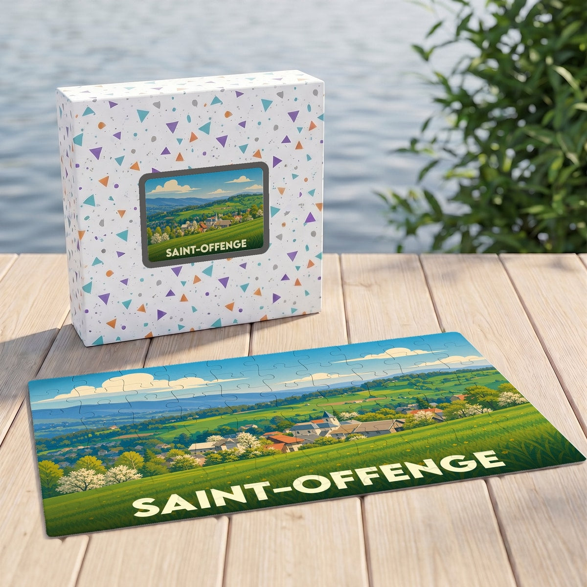 Puzzle souvenir de la ville de Saint-Offenge avec une illustration paysagère stylisée.