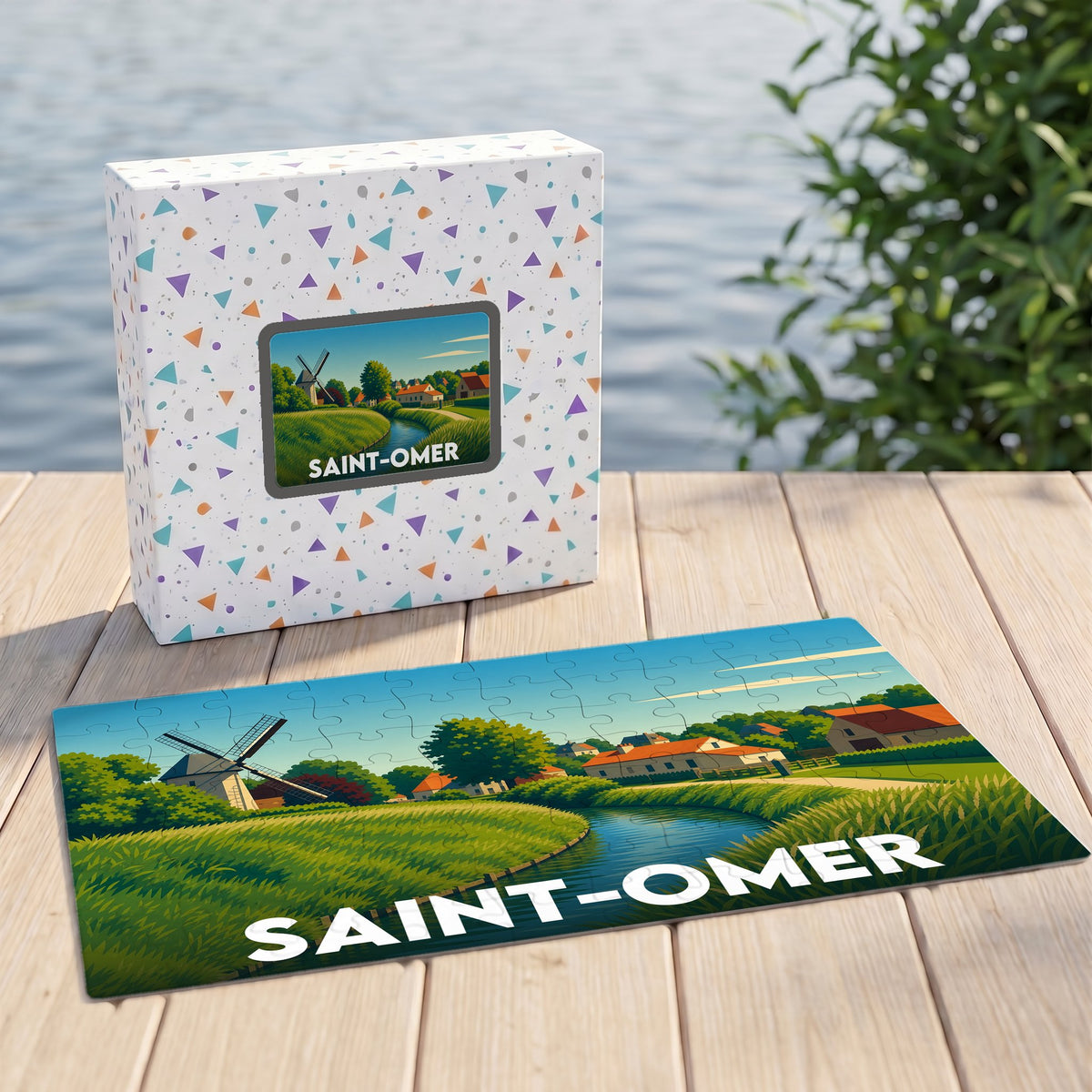 Puzzle souvenir de la ville de Saint-Omer avec une illustration stylisée d'un paysage de marais et de moulins.