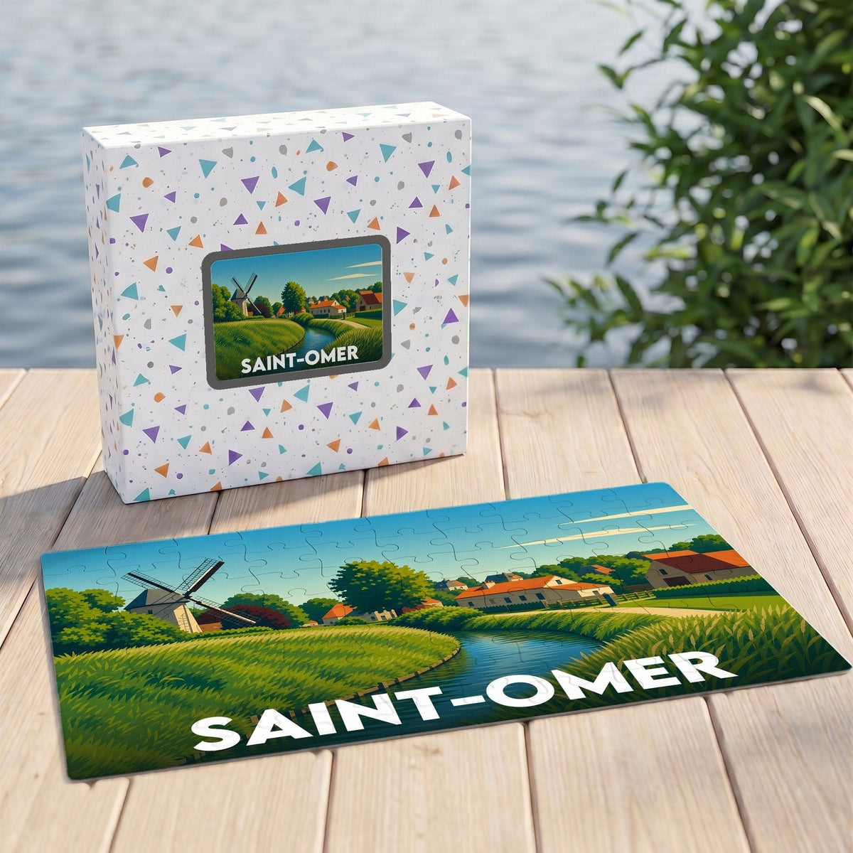 Puzzle souvenir de la ville de Saint-Omer avec une illustration stylisée d'un paysage de marais et de moulins.