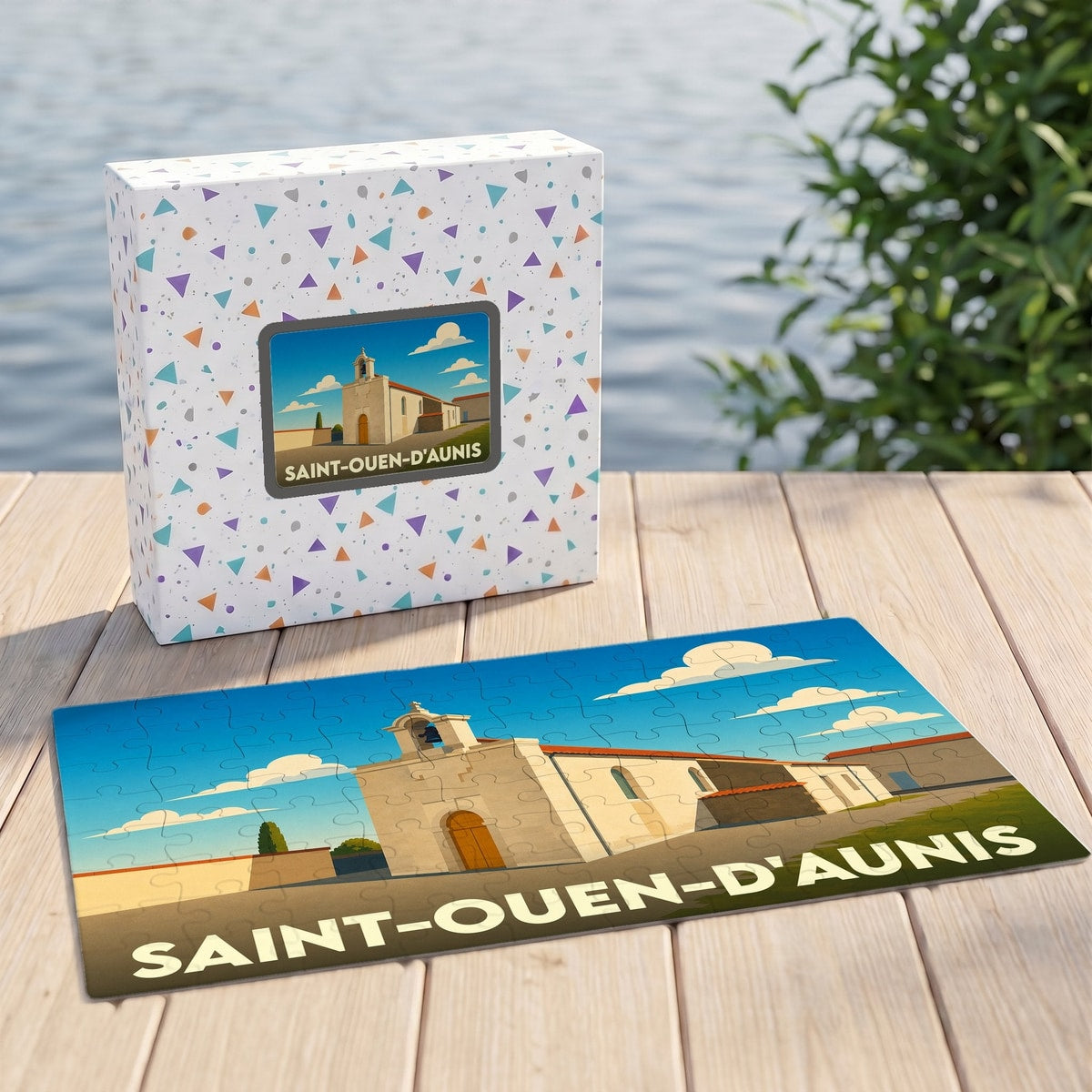 Puzzle souvenir de la ville de Saint-Ouen-d'Aunis avec son illustration stylisée et sa boîte assortie.