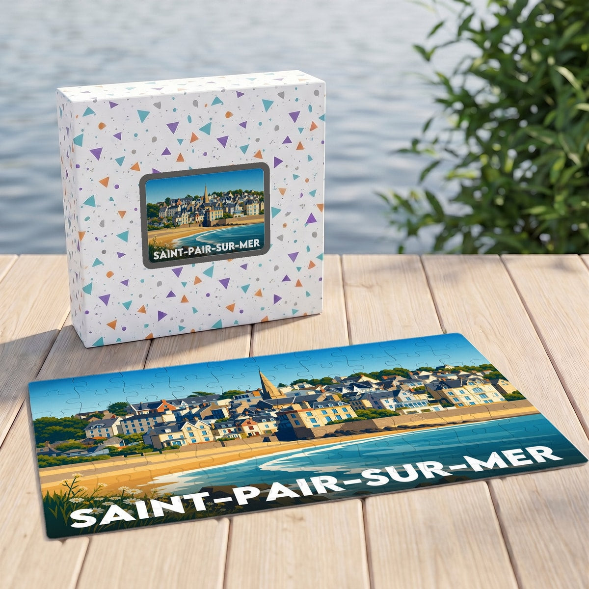 Puzzle souvenir de la ville de Saint-Pair-sur-Mer avec son illustration balnéaire stylisée et sa boîte assortie.