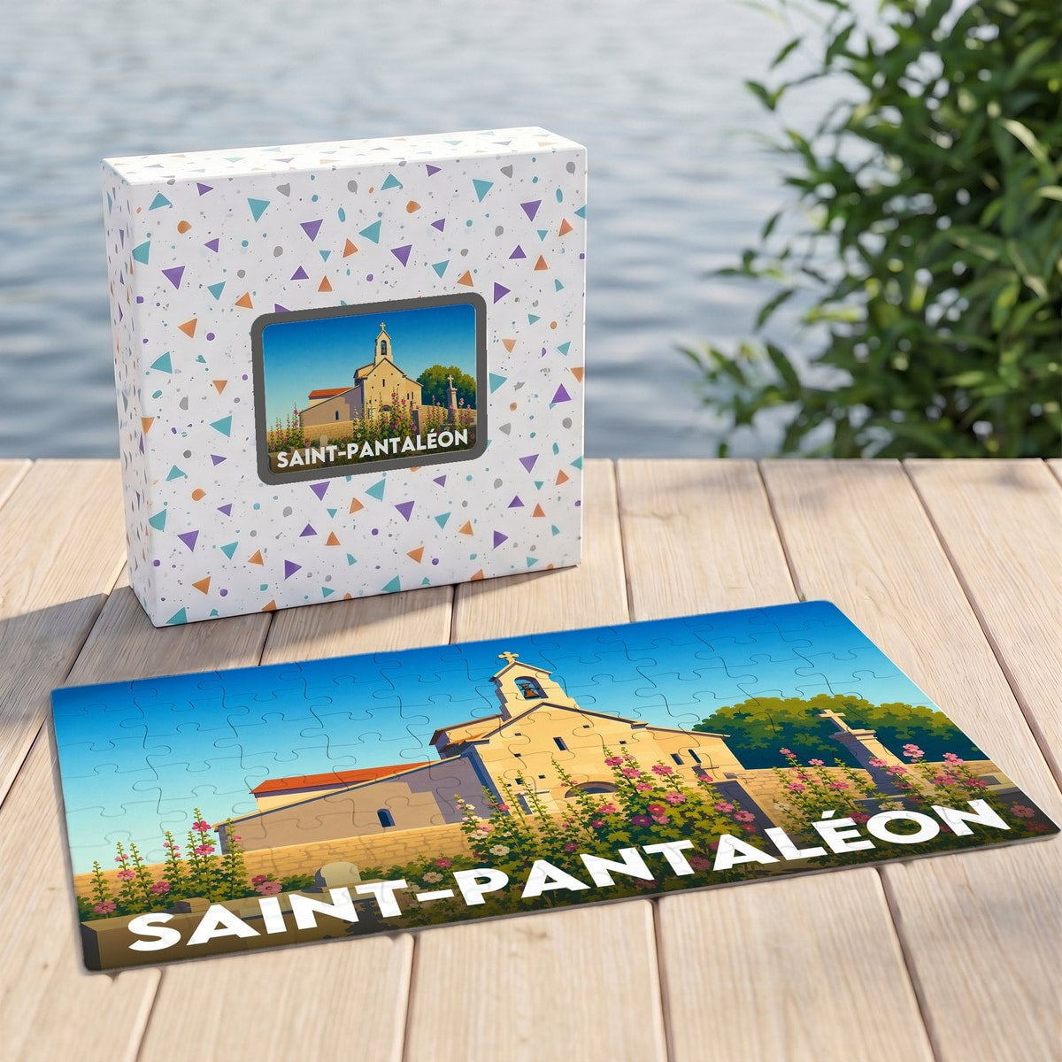 Puzzle souvenir de la ville de Saint-Pantaléon avec une illustration stylisée d'une église provençale.