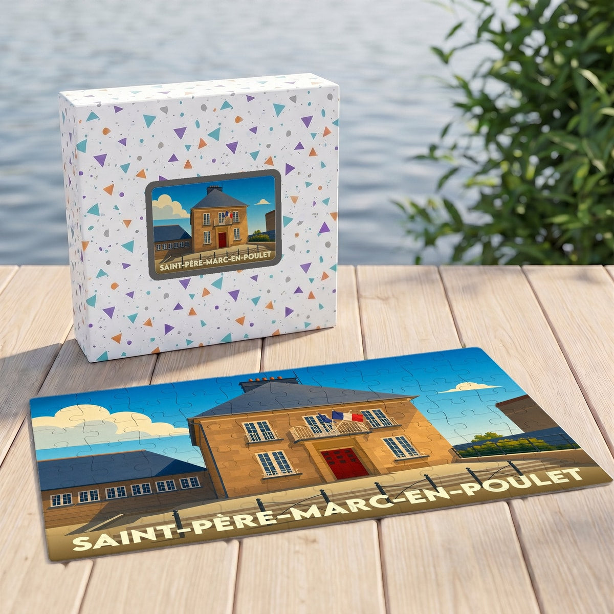 Puzzle souvenir de la ville de Saint-Père-Marc-en-Poulet avec une illustration stylisée de sa mairie.
