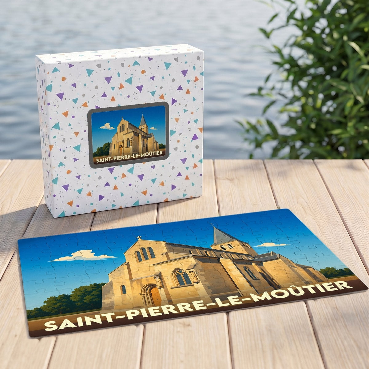 Puzzle souvenir de la ville de Saint-Pierre-le-Moûtier avec une illustration stylisée de son église.
