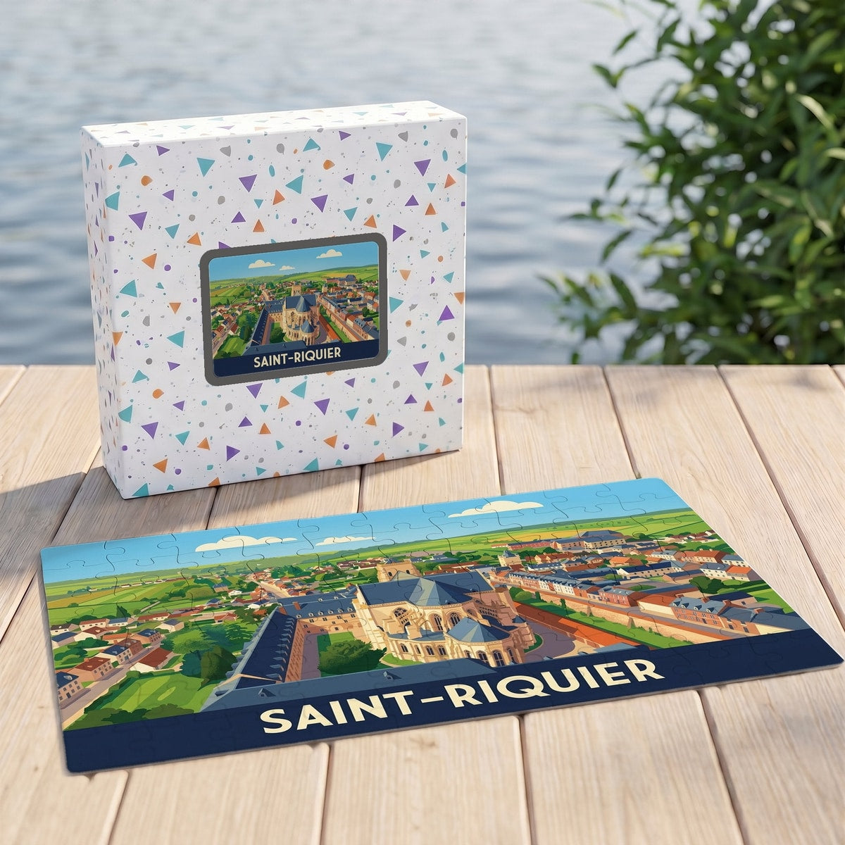 Puzzle souvenir de la ville de Saint-Riquier avec une illustration stylisée de son abbaye et de ses environs.