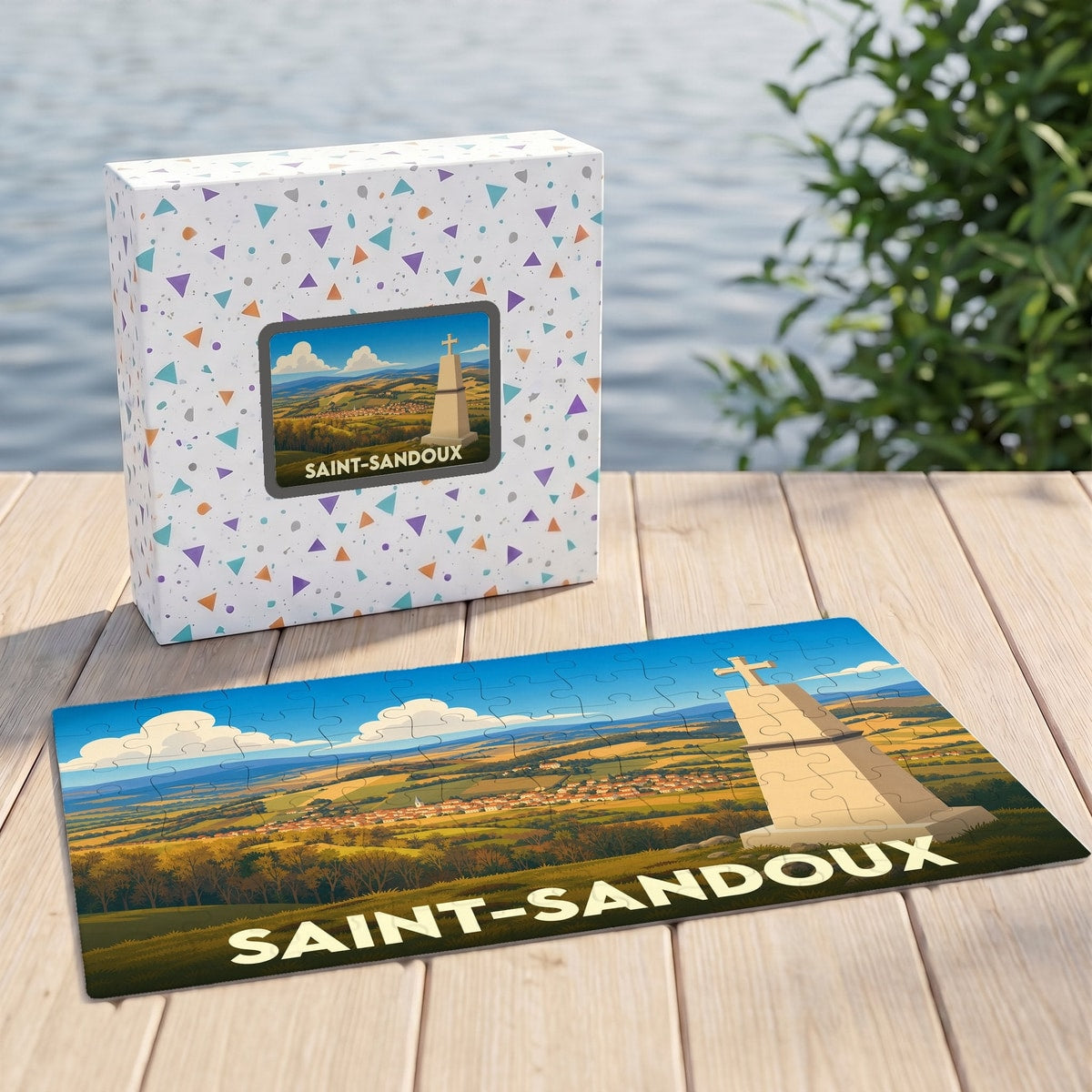 Puzzle souvenir de la ville de Saint-Sandoux avec une illustration stylisée de son paysage et de son monument.