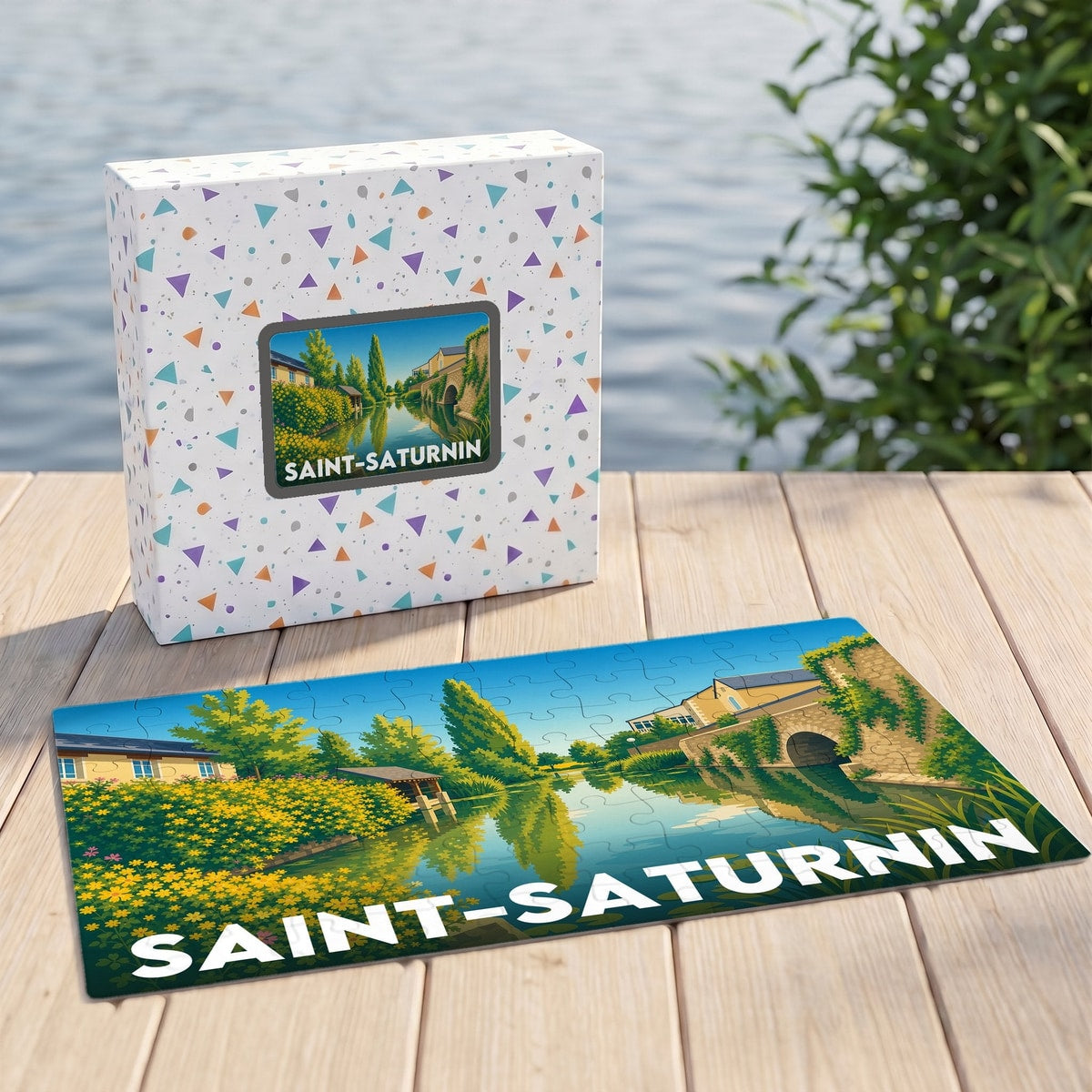 Puzzle souvenir de la ville de Saint-Saturnin avec une illustration stylisée de son paysage fluvial.