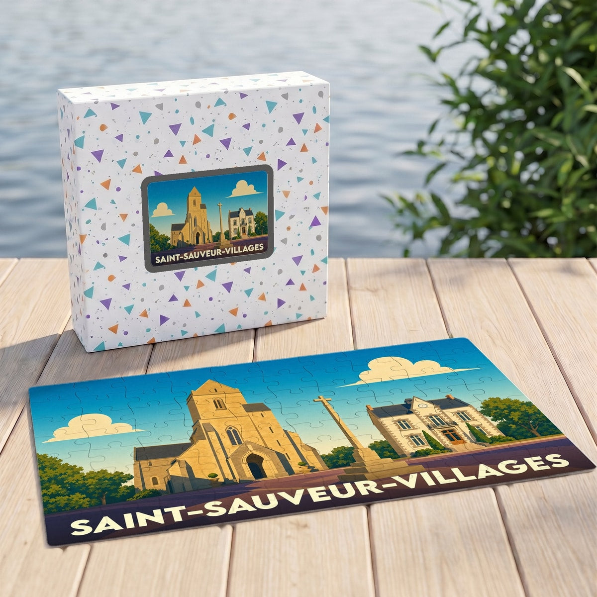 Puzzle souvenir de la ville de Saint-Sauveur-Villages avec une illustration stylisée d'une église et de son village.