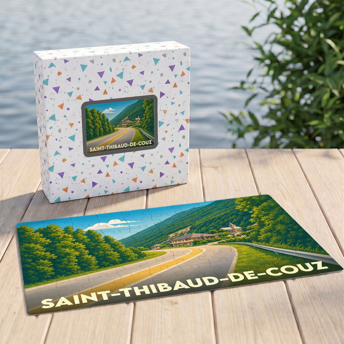 Puzzle souvenir de la ville de Saint-Thibaud-de-Couz avec une illustration stylisée de sa route de montagne.