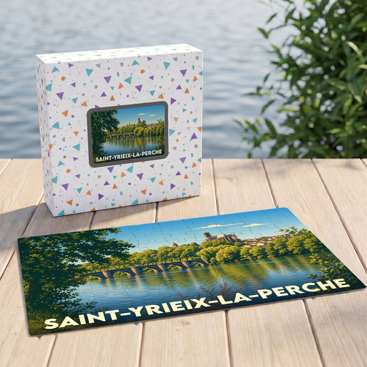 Puzzle souvenir de la ville de Saint-Yrieix-la-Perche avec une illustration stylisée de son pont et de son église.
