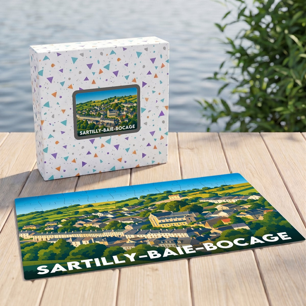 Puzzle souvenir de la ville de Sartilly-Baie-Bocage illustrant un paysage de campagne vallonné.