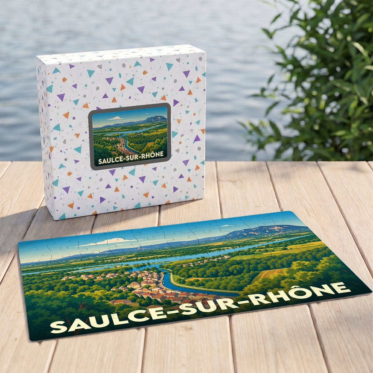 Puzzle souvenir de la ville de Saulce-sur-Rhône avec une illustration paysagère stylisée.